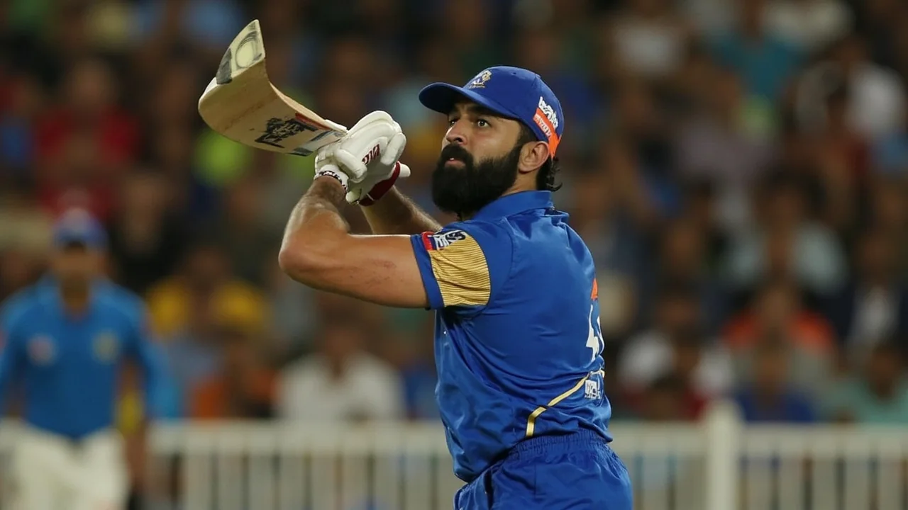 A captain in stance at the crease, gloves on, ready to receive the next delivery
